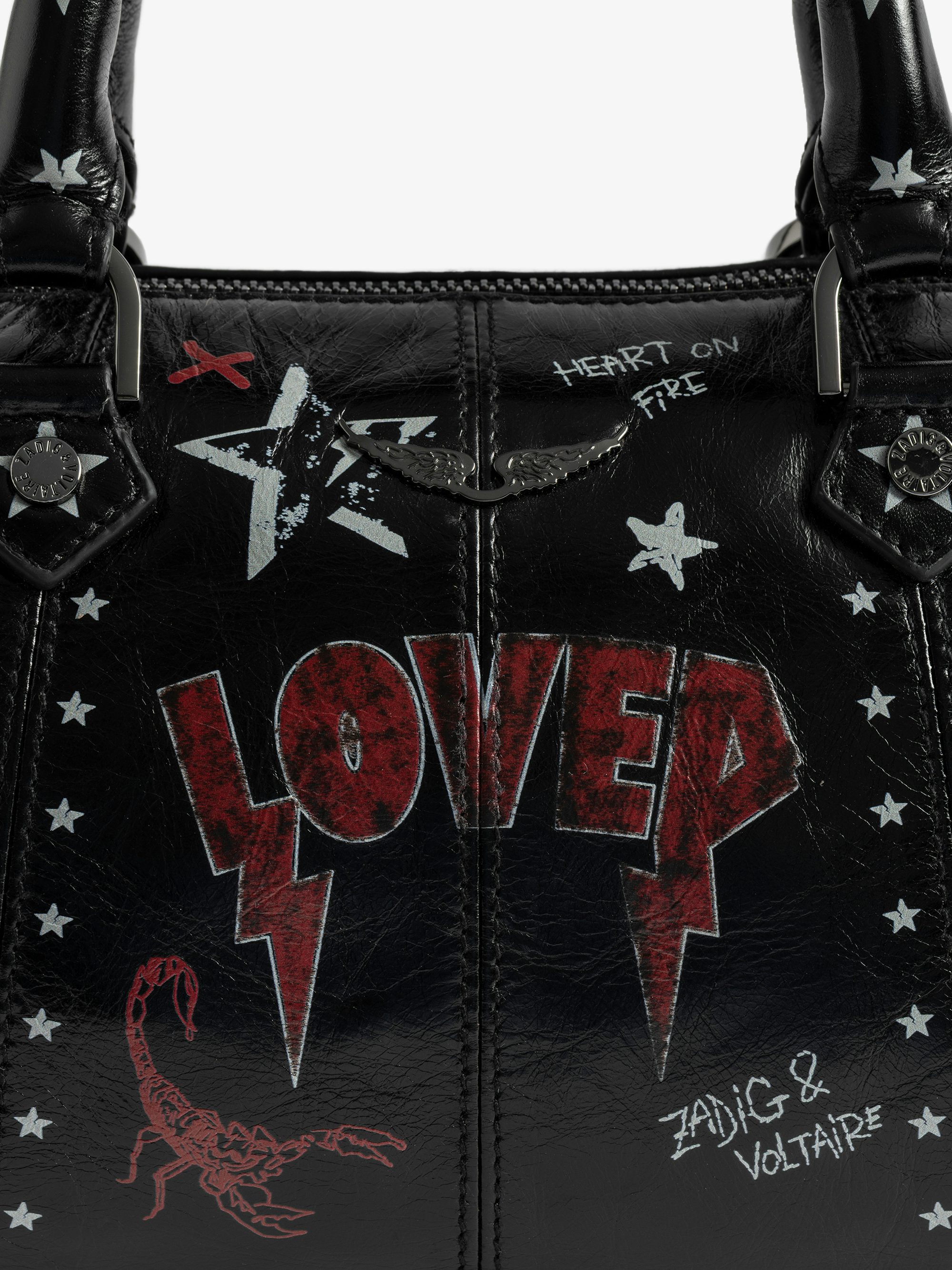 Sunny XS Punk Bag - Mini bag in patent leather with vintage effect, punk tag, adjustable shoulder strap and wings signature.